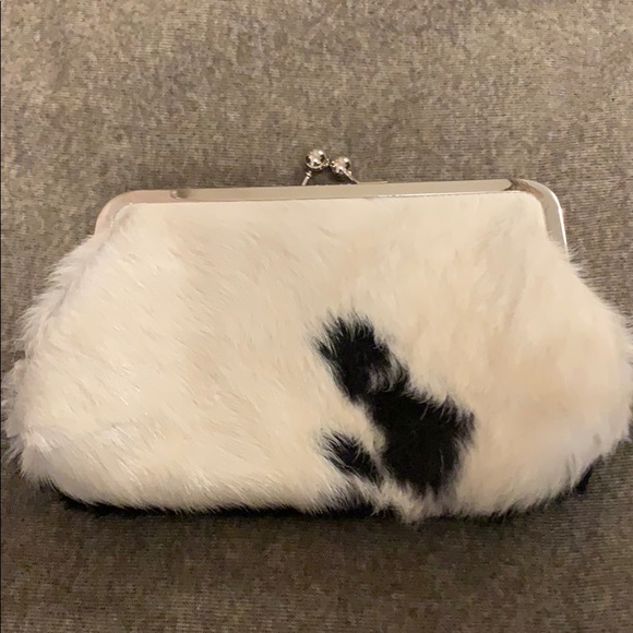 white fur clutch bag